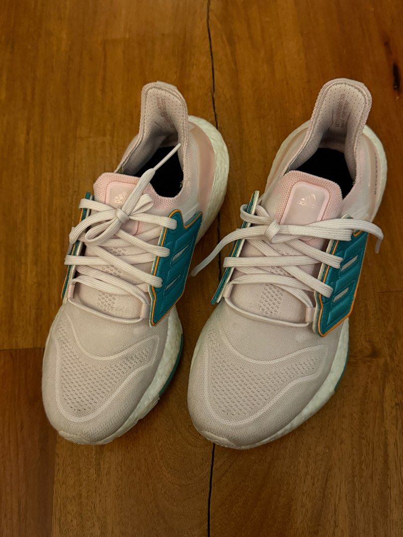 Ultra boost 22 Pink Adidas with replaceable logo rubber shoes (Category: Sneakers) located in Pasig City. Submitted by declutter_z (Listing ID 1390035818, Image 2). Description: ULTRABOOST 22 SHOES Color: Almost Pink / Almost Pink / Orange Rush Size: US 8 / 40 Logo can be replaced with pink color Negotiable Pick up Pasig.