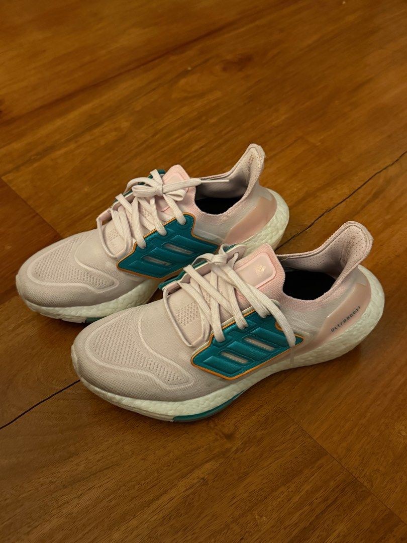 Ultra boost 22 Pink Adidas with replaceable logo rubber shoes (Category: Sneakers) located in Pasig City. Submitted by declutter_z (Listing ID 1390035818, Image 1). Description: ULTRABOOST 22 SHOES Color: Almost Pink / Almost Pink / Orange Rush Size: US 8 / 40 Logo can be replaced with pink color Negotiable Pick up Pasig.