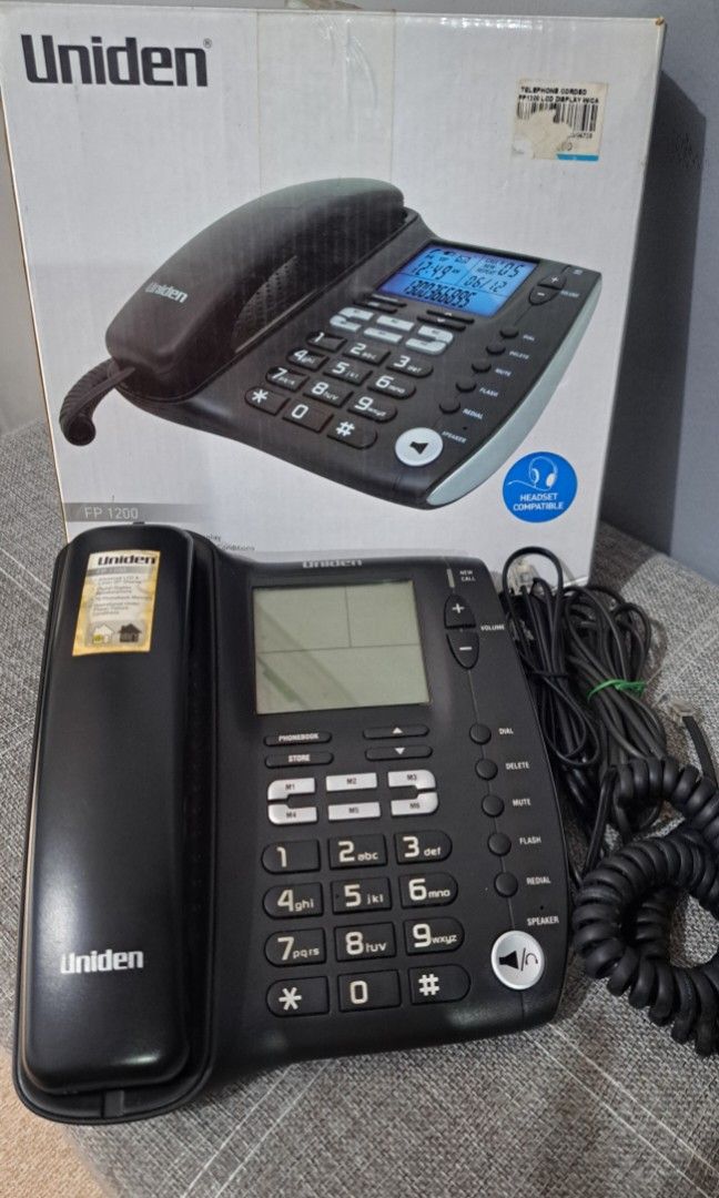 Uniden landline speaker telephone (Category: Office & Business Technology) located in Quezon City. Submitted by kirstenbella (Listing ID 1390107741, Image 1). Description: Uniden FP 1200 corded telephone -​Display & Caller ID: ​Backlit Ice Blue LCD Display ​Advanced LCD & Caller ID* Display -​Visual Message Waiting and New Call Indicator -​Digital Duplex Speakerphone on base ​Flash Button (Call Waiting Compatible) -​On Hook Dialling -​Last Number