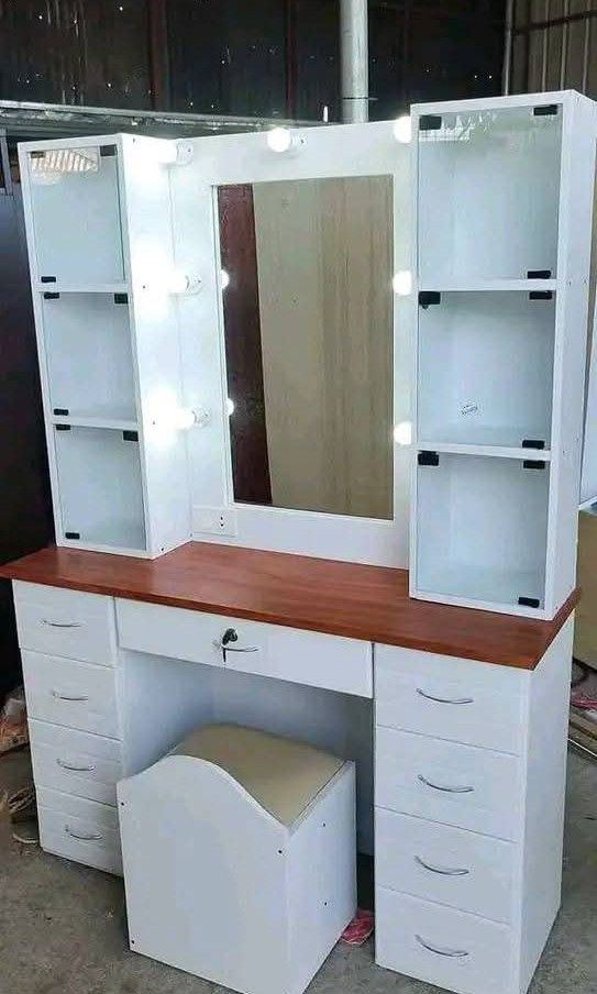 VANITY DRESSER WITH BULB (Category: Shelves, Cabinets & Racks) located in Mabalacat. Submitted by arlenemamangun01 (Listing ID 1390089186, Image 3). Description: "Get ready to glow! 💄💅 Made-to-order Makeup Table/Vanity Dresser with Mirror Plyboard vinyl laminated, with lights and chair Glass table or wood table options available 100% quality guaranteed! 💯 Best seller alert! 🔥 Message us to order now! 📲".
