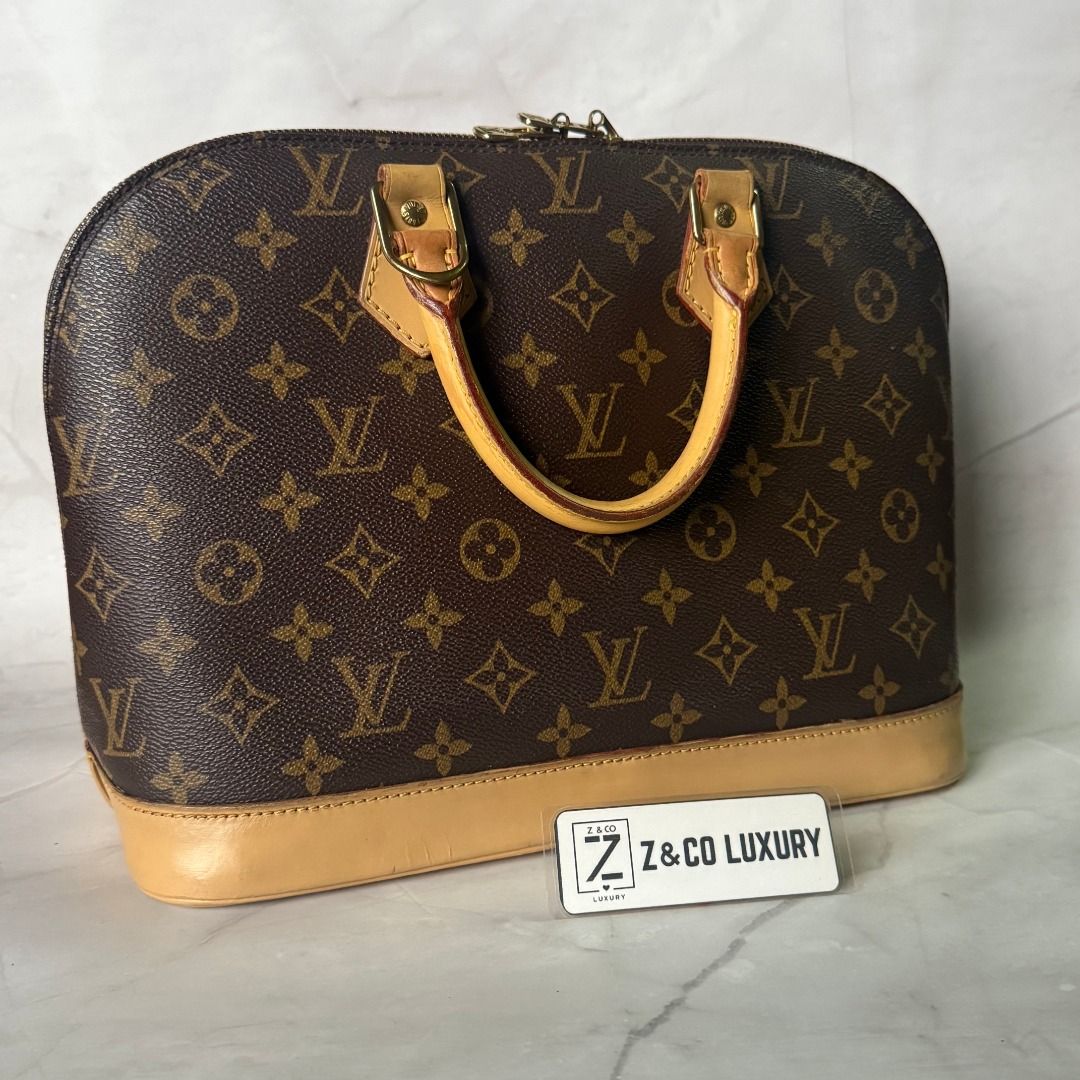 Authentic LV Alma mono PM (Category: Luxury Bags & Wallets) located in Caloocan City. Submitted by zandcoluxury (Listing ID 1391778142, Image 2). Description: LOUIS VUITTON ALMA MONO PM ▫️ 💯 Guaranteed Authentic ▫️ BRAND: Louis Vuitton ▫️ MATERIAL/COLOR: Monogram Canvas ▫️ HARDWARE: Gold ▫️ INCLUSION: Bag and generic twilly ▫️ SELLING PRICE: Php 20,000 ▫️ CONDITION: Great Condition 8.5/10 ▫️ NOTES: this is re-🎨 vanchetta, some with hardware chi