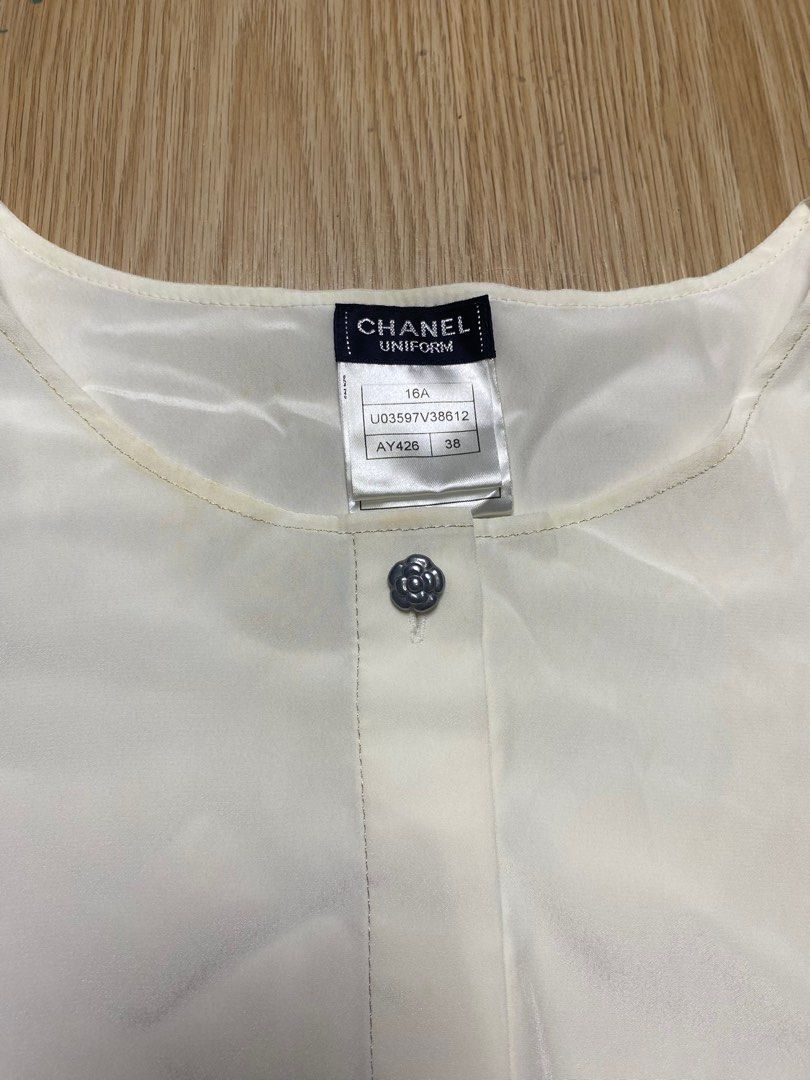 Chanel Uniform sleeved blouse (Category: Luxury Apparel) located in Olongapo. Submitted by copnsold (Listing ID 1391857560, Image 2). Description: Chanel 25”Length 18”Width .