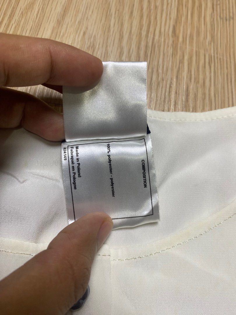 Chanel Uniform sleeved blouse (Category: Luxury Apparel) located in Olongapo. Submitted by copnsold (Listing ID 1391857560, Image 3). Description: Chanel 25”Length 18”Width .