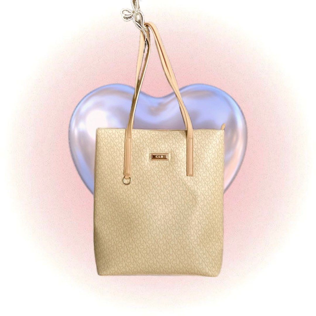 cln beige leather monogram office chic everyday use tote bag (Category: Tote Bags) located in Talavera. Submitted by zaiabels (Listing ID 1391787091, Image 1). Description: cln kiarra tote bag ♡ original price: ₱2,499 ♡ in excellent condition! ♡ with dual straps and three very spacious compartments ♡ with zip-top closure and two magnetic snap pockets ♡ with zipper pocket and slip pocket inside the main compartment ♡ fits devices up to 11” ♡ detac