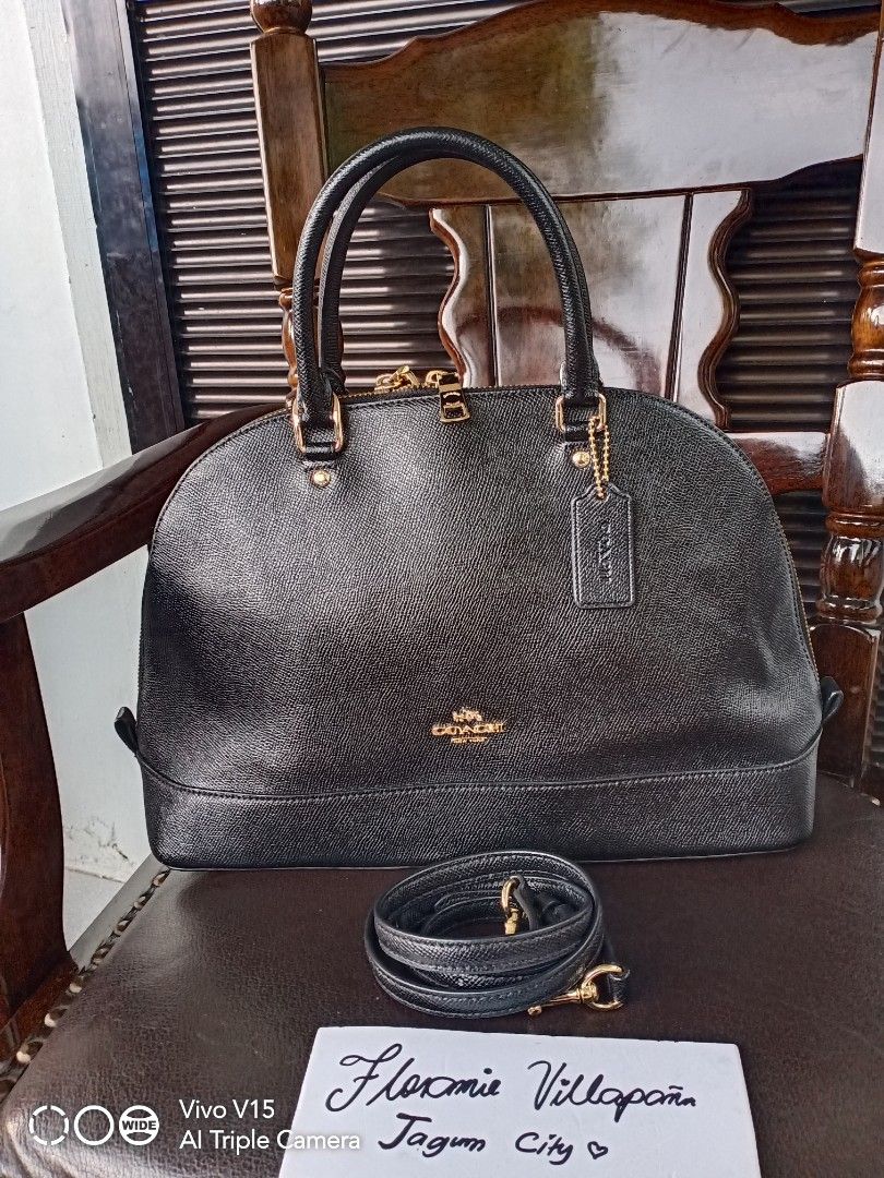 Coach Alma type (Category: Luxury Bags & Wallets) located in Tagum. Submitted by luxbagelyas (Listing ID 1391881700, Image 1). Description: with flaws sa creed med to large size good condition not faded black na black.