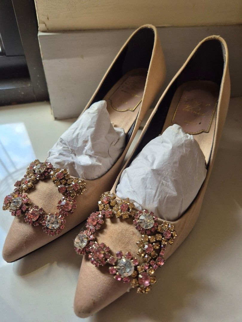 Heels: Roger Vivier (Category: Sneakers & Footwear) located in Cebu City. Submitted by aiakomatsuu (Listing ID 1391816205, Image 1). Description: Roger Vivier UK size 35/US size 5 made in Italy heel height: 1.5 in signs of use: scuffmarks, soles, some minimal dirt, suggest professional shoe restorer for satin covering and cleaning no stones missing no box or bag RFS: no longer fits (feet got swollen) negotiable but not too low please + SF to your