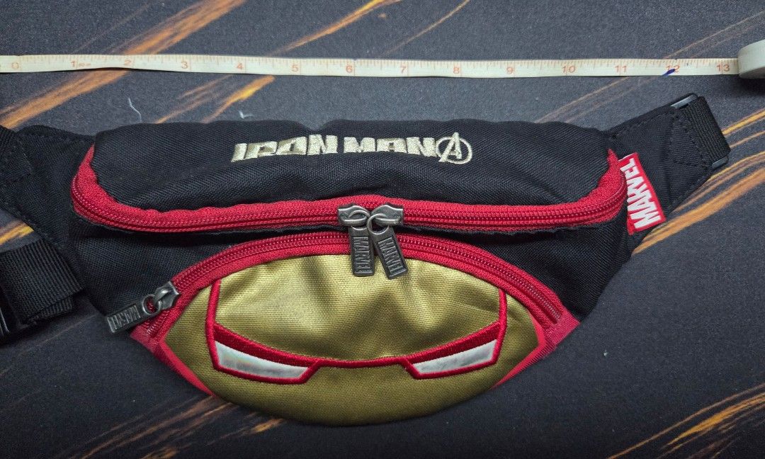 Ironman Belt Bag (Kid's size) (Category: Belt bags, Clutches and Pouches) located in Cainta. Submitted by DBdibs (Listing ID 1391750081, Image 1). Description: 👀 Reading is essential. Make reading a habit. Ironman Belt Bag (Kid's) ⭐ See photos for approximate size ⭐ Authentic Marvel merch ⭐ Complete, working zippers ⭐ No holes, no tears ⭐ Item in excellent condition 🏠 Item will be coming from Cainta, Rizal 🏘️ Can ship from QC (Brgy. Holy Spiri