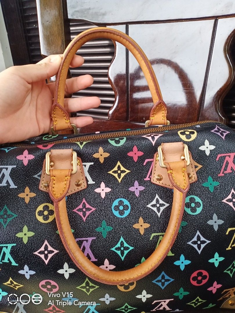 Lv multi color (Category: Luxury Bags & Wallets) located in Tagum. Submitted by luxbagelyas (Listing ID 1391882332, Image 3). Description: with flaws cracks sa vachetta parang speedy 30 bawal sa maselan.