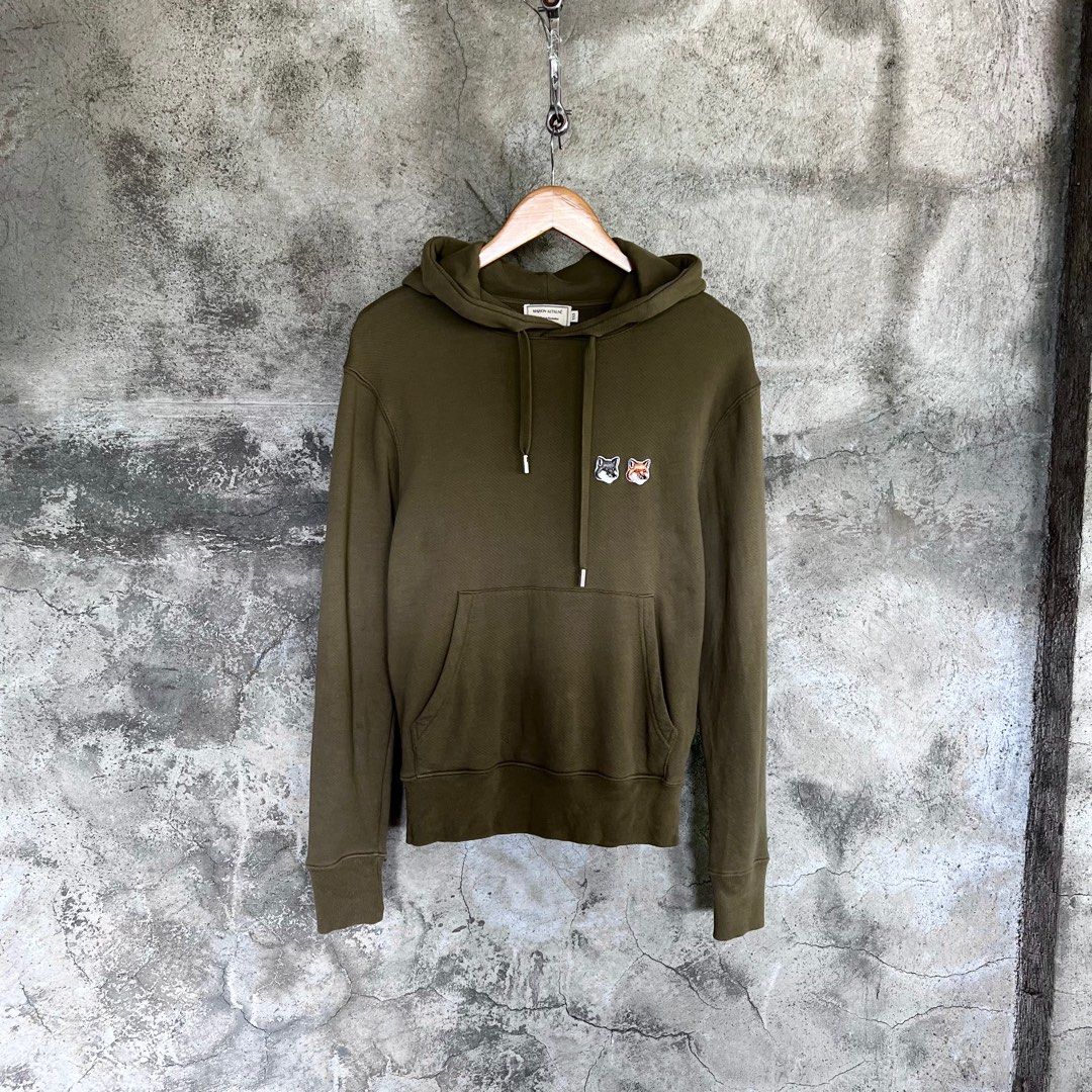 Maison Kitsune Olive Double Fox Head Hoodie (Category: Luxury Apparel) located in Baguio. Submitted by oh.seph (Listing ID 1391747896, Image 2). Description: XXS on tag Width – 18.5 Shoulder – 19 Length – 25 .