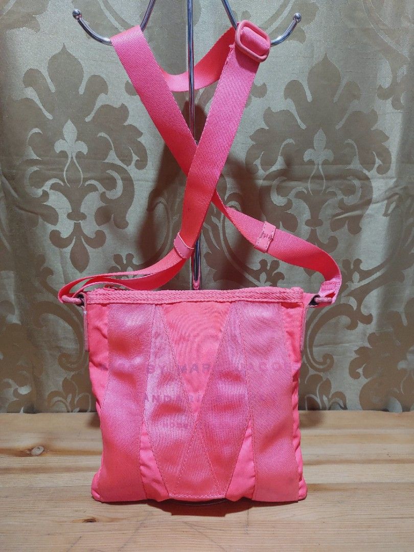 Marc Jacobs Sling Bag (Category: Luxury Bags & Wallets) located in Muntinlupa City. Submitted by sakurambo_des (Listing ID 1391910028, Image 2). Description: 350 SALE Marc Jacobs Crossbody bag Spring 2012 Neon pink Issue-lightly dirt ang body & lightly sticky sa loob but still useable..