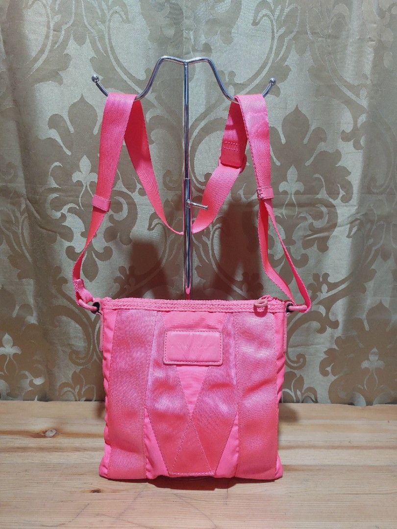 Marc Jacobs Sling Bag (Category: Luxury Bags & Wallets) located in Muntinlupa City. Submitted by sakurambo_des (Listing ID 1391910028, Image 1). Description: 350 SALE Marc Jacobs Crossbody bag Spring 2012 Neon pink Issue-lightly dirt ang body & lightly sticky sa loob but still useable..