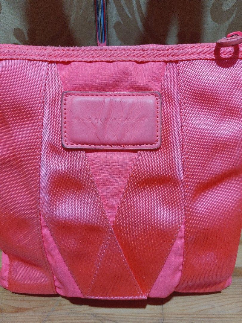 Marc Jacobs Sling Bag (Category: Luxury Bags & Wallets) located in Muntinlupa City. Submitted by sakurambo_des (Listing ID 1391910028, Image 3). Description: 350 SALE Marc Jacobs Crossbody bag Spring 2012 Neon pink Issue-lightly dirt ang body & lightly sticky sa loob but still useable..