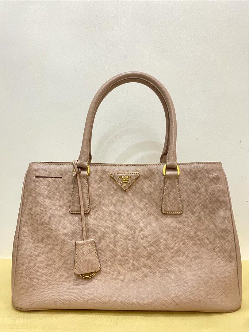 Prada Saffiano Lux Tote Medium (dusty rose) (Category: Luxury Bags & Wallets) located in Manila. Submitted by anxiousbaker (Listing ID 1391865520, Image 1). Description: - authentic - with dust bag and card .
