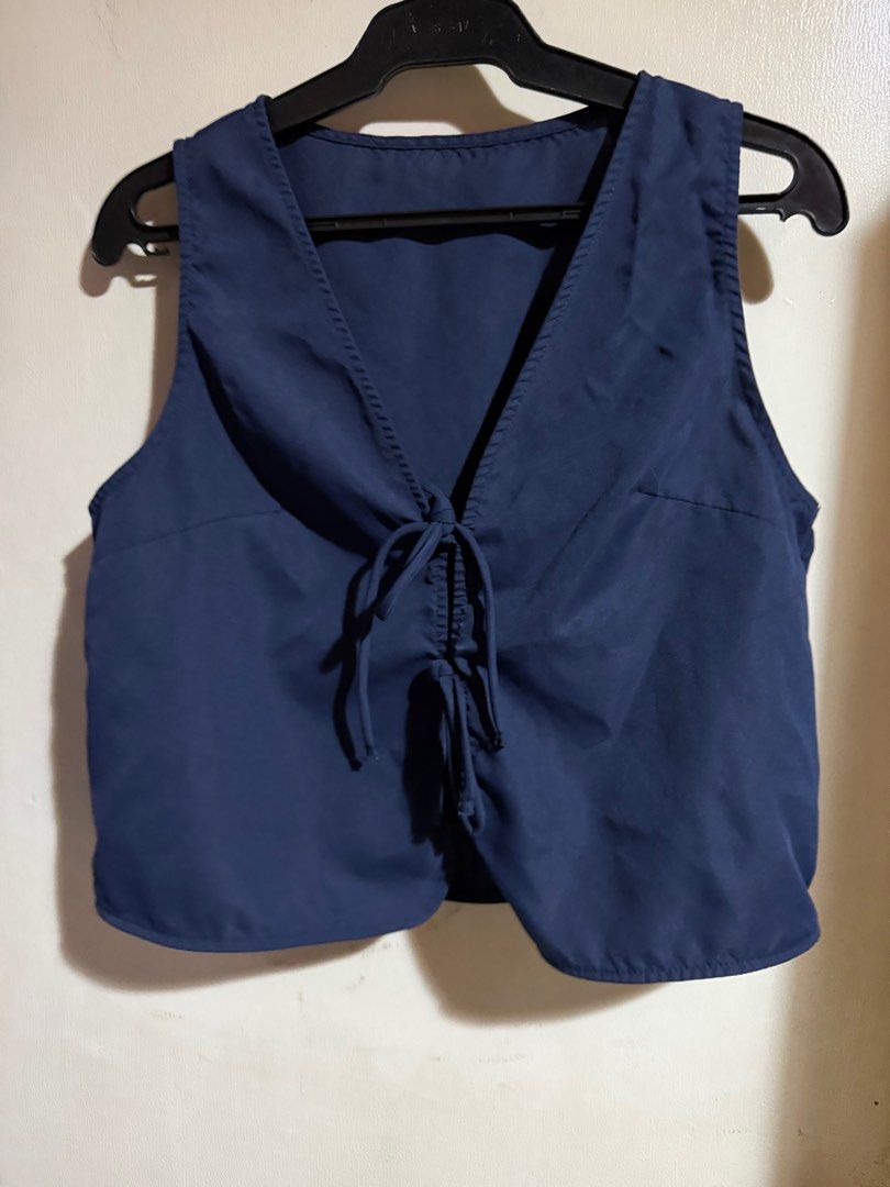 Shein Dark Blue Front Tie Sleeveless Top (Category: Sleeveless) located in Marikina City. Submitted by declutteringera (Listing ID 1391888760, Image 3). Description: - size L - fits up to 36" bust since it's loose - in excellent condition; used only once RFS: decluttering.