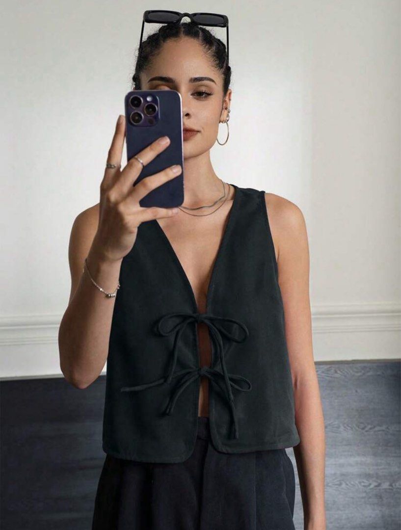 Shein Dark Gray Front Tie Sleeveless Top (Category: Sleeveless) located in Marikina City. Submitted by declutteringera (Listing ID 1391888986, Image 1). Description: - size L - fits up to 36" bust since it's loose - in excellent condition; used only once RFS: decluttering.