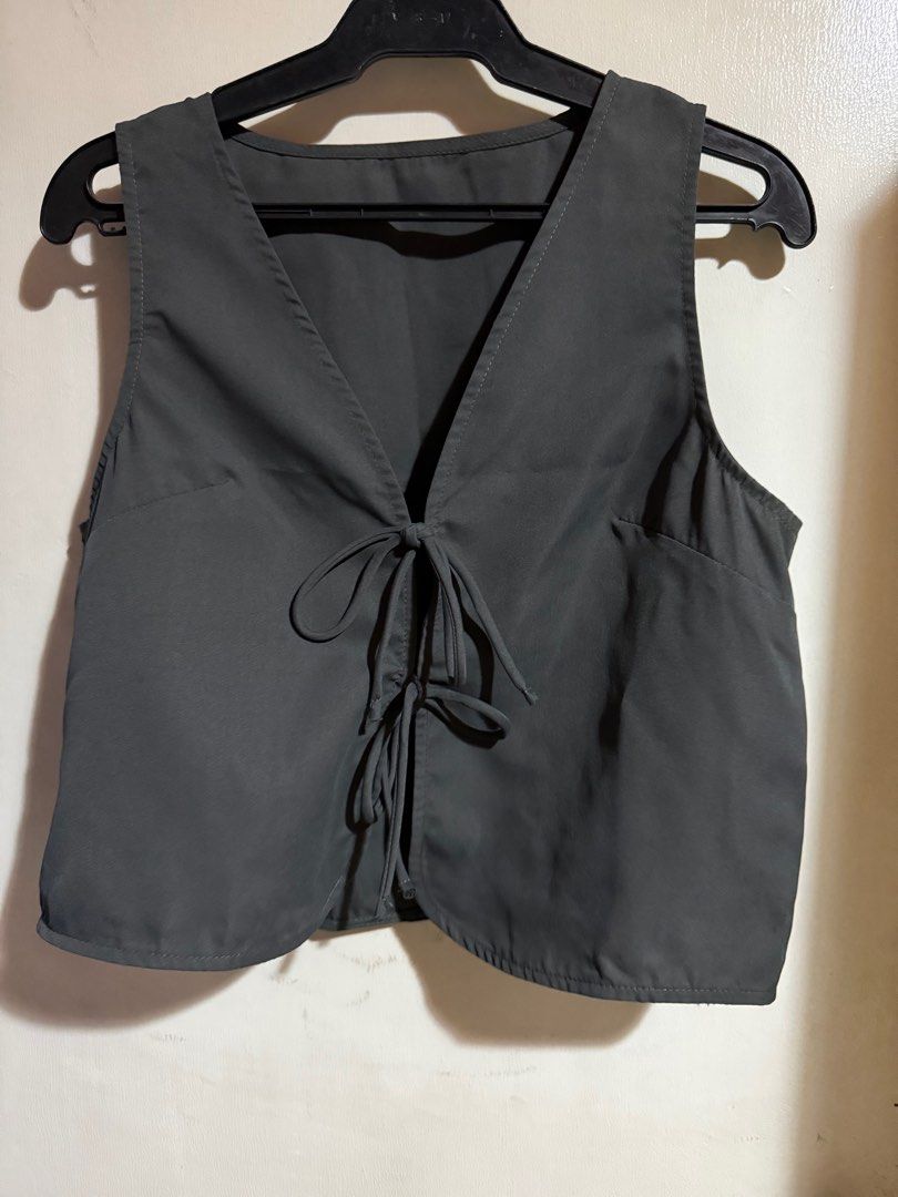 Shein Dark Gray Front Tie Sleeveless Top (Category: Sleeveless) located in Marikina City. Submitted by declutteringera (Listing ID 1391888986, Image 3). Description: - size L - fits up to 36" bust since it's loose - in excellent condition; used only once RFS: decluttering.