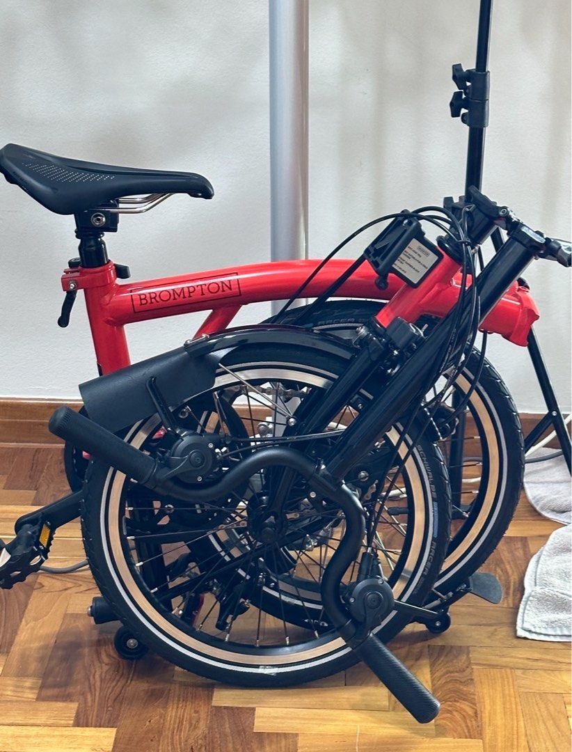 Stem Catcher (Category: Bicycles) located in Singapore. Submitted by rhiginebra (Listing ID 1391852239, Image 2). Description: - Black bike part - Features a metal loop - Includes a screw - Good condition - Exact function unknown.