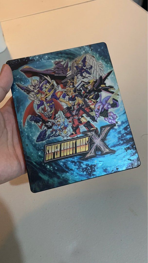 Super Robot Wars X Exclusive Steelbook Case (Category: PlayStation) located in Pasig City. Submitted by princessashniko (Listing ID 1391858188, Image 1). Description: Super Robot Wars X Exclusive Steelbook Case w/o Game Includes: • Steelbook Case • Plastic cover • Bubble wrap RFS: Change of collection Shipping: Lalamove / Grab / LBC (Buyer’s expense) Meet-up: Megamall/Podium MOP: Gcash, Security Bank, BPI, UnionBank.