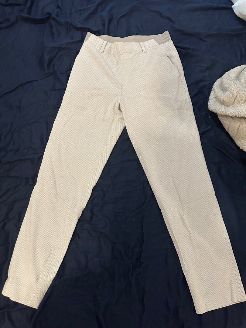 Uniqlo White Striped Smart Ankle Pants (Category: Other Bottoms) located in Manila. Submitted by cnik8 (Listing ID 1391799366, Image 1). Description: Uniqlo White Smart Ankle Pants -with light textured design, quite soft Small size Garterized waist.
