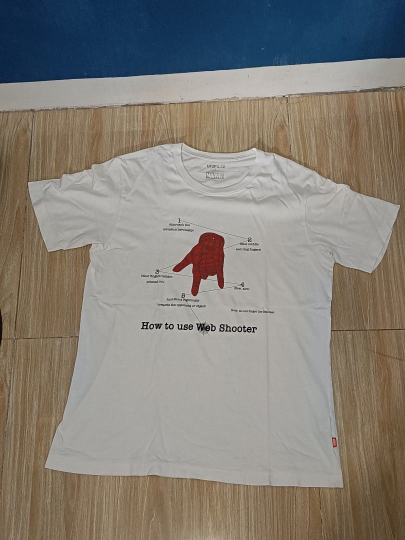 Uniqlo Tee (Category: Tshirts & Polo Shirts ) located in Manila. Submitted by hate9ten (Listing ID 1391817727, Image 1). Description: 22.5x30 QC Loc.