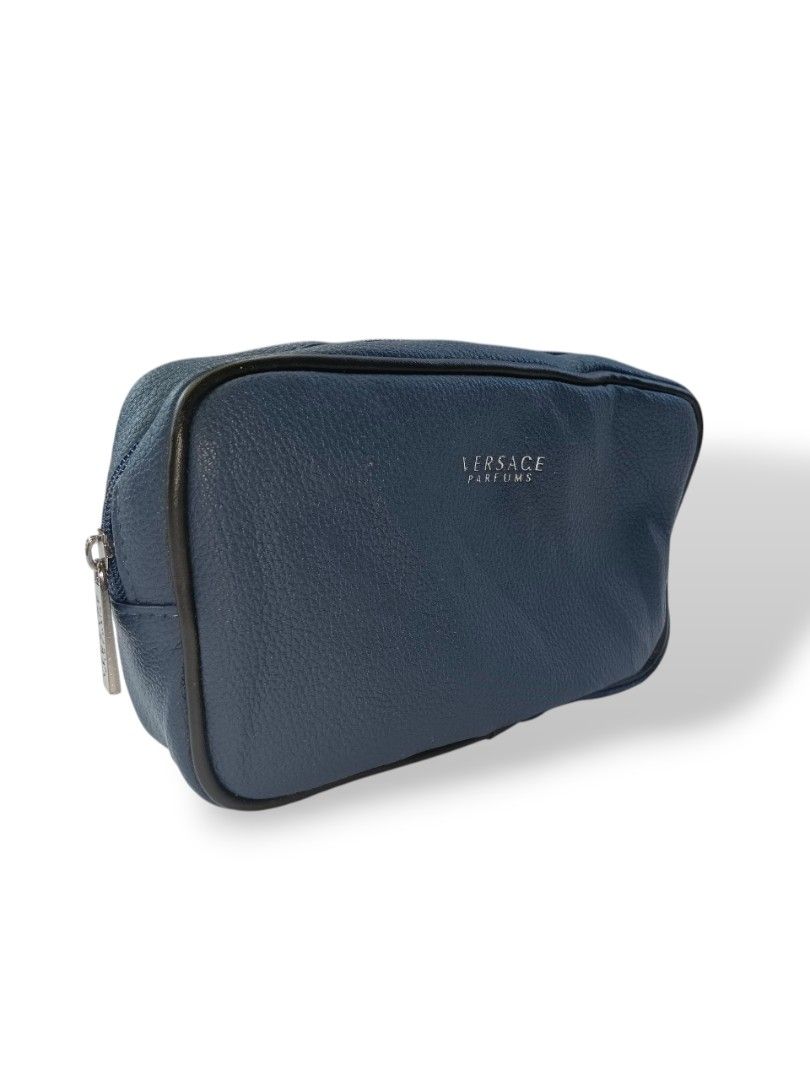 Versace Clutch Bag (Category: Luxury Bags & Wallets) located in Davao. Submitted by jecks9 (Listing ID 1391905659, Image 2). Description: leather material prestine condition 10/10 colorate paint stain see photos for details still presentable to use MAKE OFFER 📌.