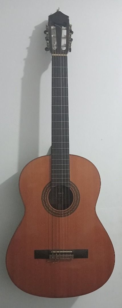 Yamaha Classical G-70A 1969 Natural (Category: Musical Instruments) located in Quezon City. Submitted by potfishcake (Listing ID 1391815736, Image 1). Description: Yamaha Nippon Gakki G-70A A 1969 Yamaha Classical G-70A guitar in very good shape. Admire the full character of this 55-year old guitar. The sound hole rosette and bridge detail are specific to 1969 production from what we have determined. What we have researched so far: Made in Japan 