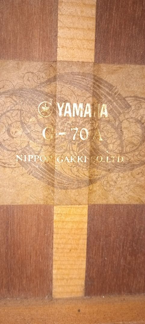 Yamaha Classical G-70A 1969 Natural (Category: Musical Instruments) located in Quezon City. Submitted by potfishcake (Listing ID 1391815736, Image 2). Description: Yamaha Nippon Gakki G-70A A 1969 Yamaha Classical G-70A guitar in very good shape. Admire the full character of this 55-year old guitar. The sound hole rosette and bridge detail are specific to 1969 production from what we have determined. What we have researched so far: Made in Japan 