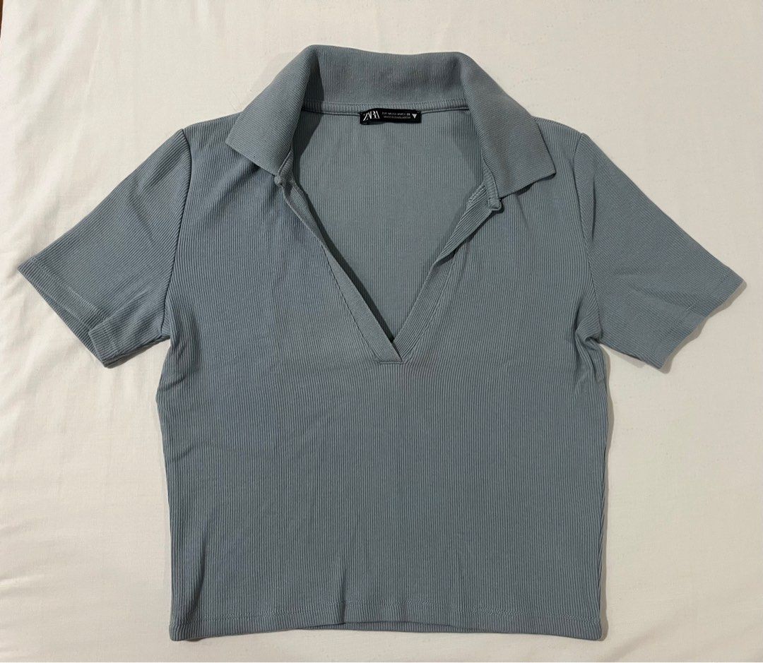 Zara Blue Ribbed Polo Shirt (Category: Shirts) located in San Pedro. Submitted by mcnby (Listing ID 1391850728, Image 3). Description: • Original Zara (bought from app for 695php) • Size: Medium • Color change due to lighting (pls refer to zara screenshort for better reference) • NEVER been worn • RFS: an impulse buy, not my style • Negotiable (message me).