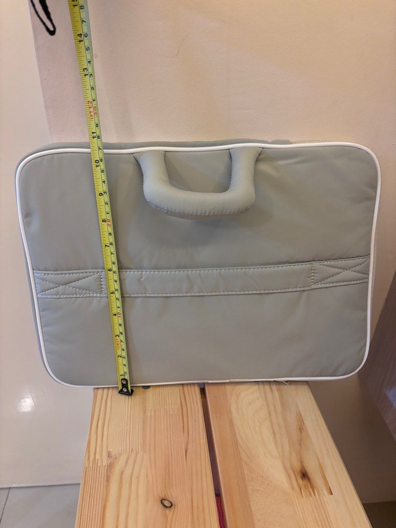 14” Laptop bag in Grey Color (Category: Laptop Bags & Sleeves) located in Quezon City. Submitted by caryatiddd (Listing ID 1392114756, Image 3). Description: - comes with plastic! - has slot for your luggage handle! - shipping c/o buyer .