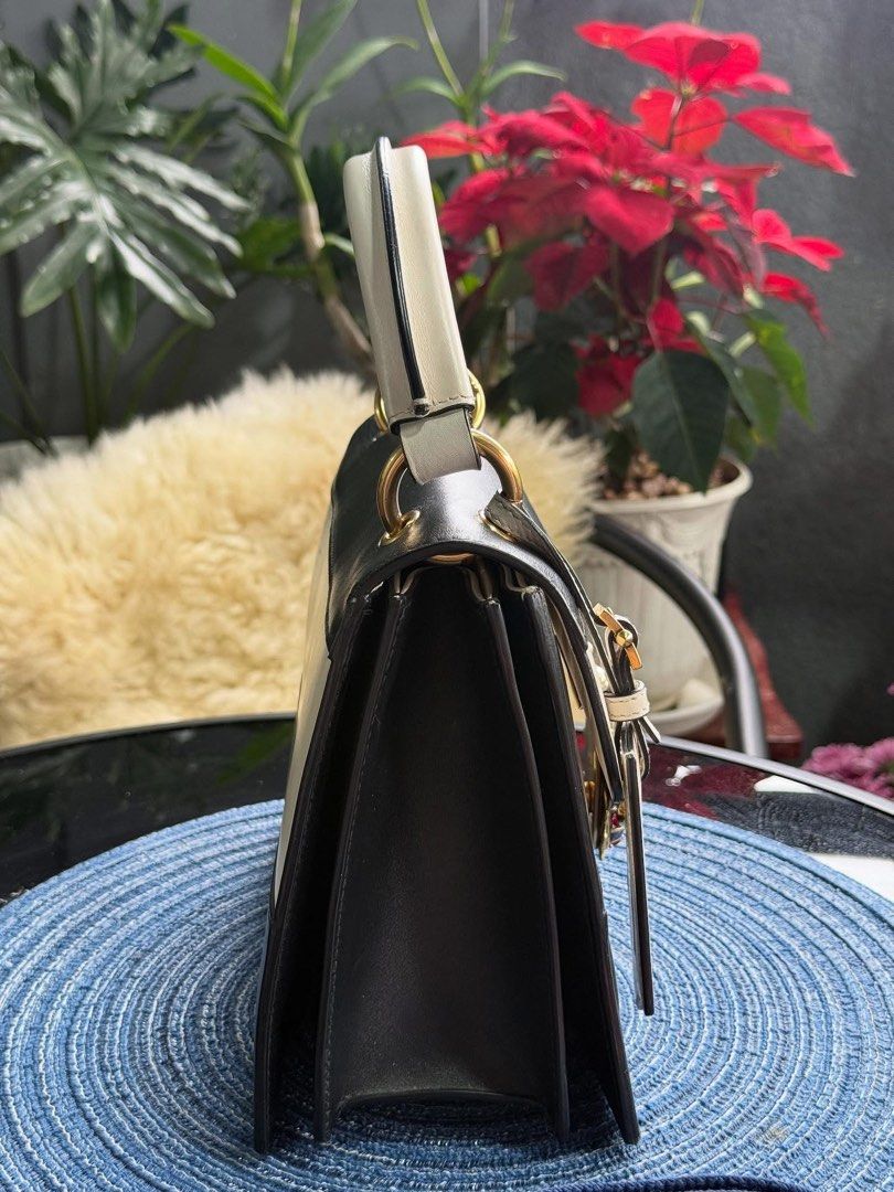 Authentic Gucci (Category: Luxury Bags & Wallets) located in Manila. Submitted by chloe_luxuries (Listing ID 1392102231, Image 3). Description: Guaranteed Original Gucci Queen Margaret medium top handle bag Still in very good condition Comes with dustbag Leather swatch strap and booklet Pm for more details.