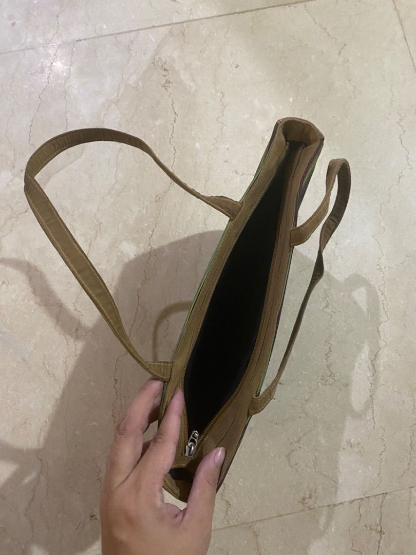 Bag-A-Holic Striped Half Moon Shoulder Bag (Category: Shoulder Bags) located in Makati City. Submitted by lenaloved (Listing ID 1391978966, Image 3). Description: Bag-A-Holic Striped Half Moon Shoulder Bag Kept in storage, needs cleaning Approx. 11.5in W x 6in H x 1.65in D Accessories : Shoulder Bag : Fashion.
