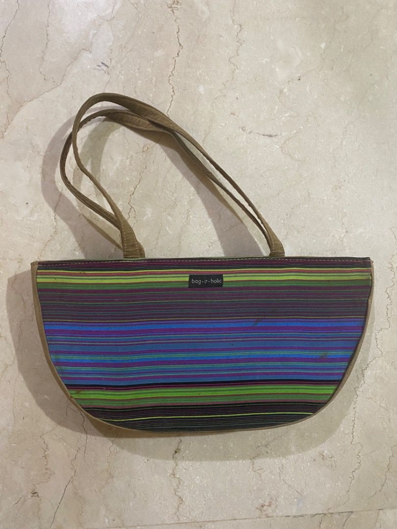 Bag-A-Holic Striped Half Moon Shoulder Bag (Category: Shoulder Bags) located in Makati City. Submitted by lenaloved (Listing ID 1391978966, Image 1). Description: Bag-A-Holic Striped Half Moon Shoulder Bag Kept in storage, needs cleaning Approx. 11.5in W x 6in H x 1.65in D Accessories : Shoulder Bag : Fashion.
