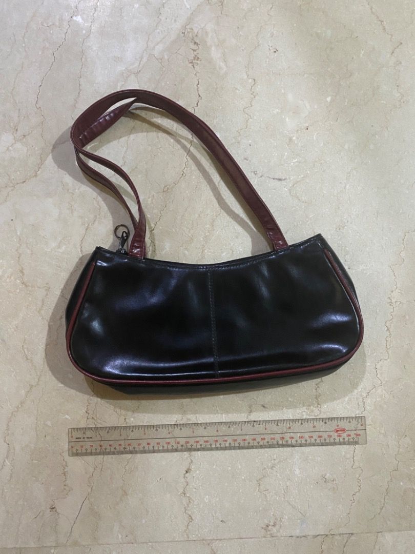 Black and Maroon Pleather Shoulder Bag (Category: Shoulder Bags) located in Makati City. Submitted by lenaloved (Listing ID 1391984660, Image 3). Description: Black and Maroon Pleather Shoulder Bag Russ by Rusty Lopez Black and maroon pleather with inner lining and zipped pocket Approx. 11.5in W x 4.5in H x 1.5in D Accessories : Shoulder Bag.