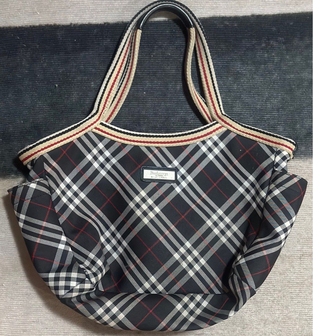Guaranteed Authentic Burberry Shoulder Bag (Category: Luxury Bags & Wallets) located in Quezon City. Submitted by donaya_luxe (Listing ID 1391980653, Image 1). Description: Original Burberry Blue Label Nova Check bag The tag inside the bag, which includes Japanese text and the company "株式会社 三陽商会" (Sanyo Shokai), indicates it is from the Burberry Blue Label line, which was a diffusion line specifically for the Japanese market. Dimension - approxim