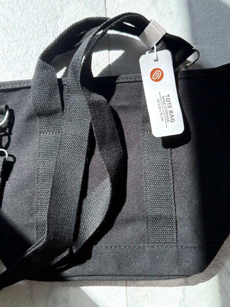 Tote / Shoulder bag (200 pesos off!) (Category: Shoulder Bags) located in Marikina City. Submitted by summerlyyy (Listing ID 1391989322, Image 3). Description: Orig price 299 & 349 Available in 2 sizes: Small size- 99 Big size- 149 W/ adjustable long strap White spots can be cleaned by lint roller :).