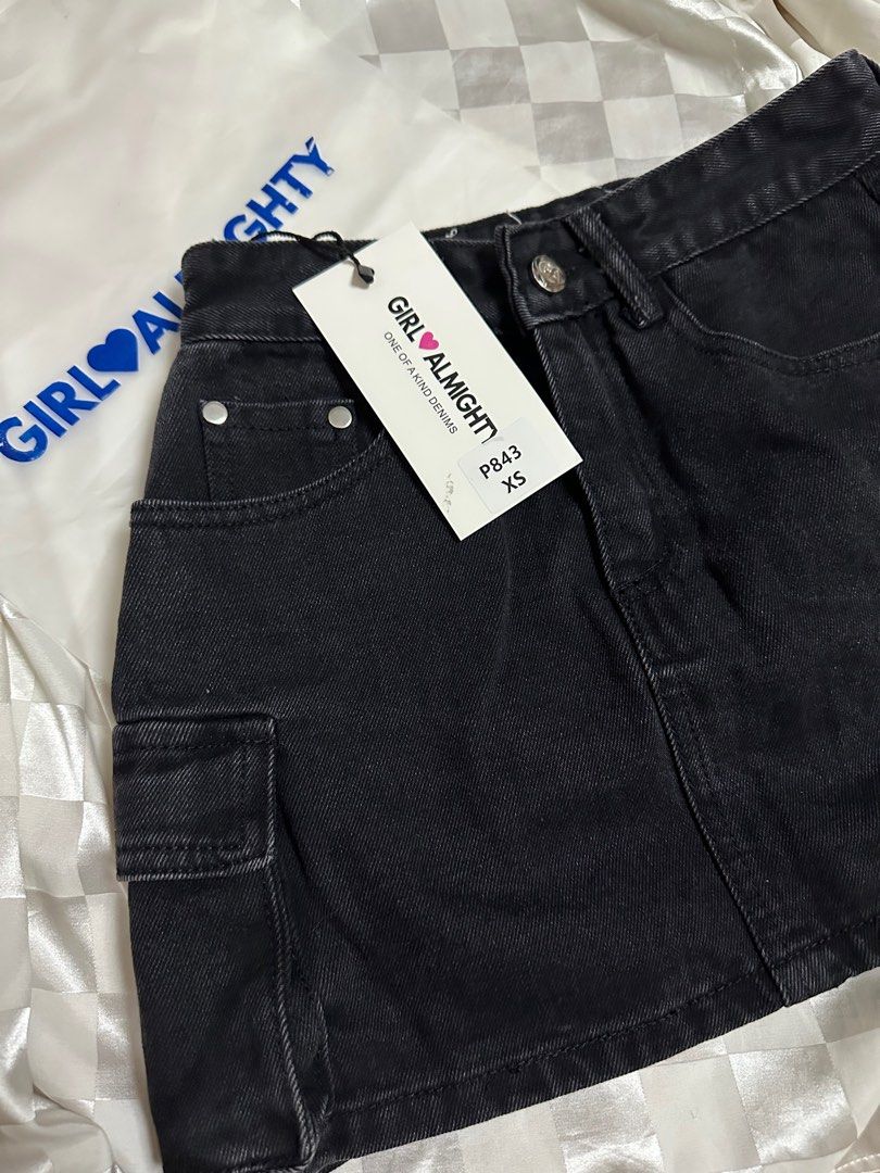 Cargo Skirt from GIRL ALMIGHTY (Category: Skirts) located in Valenzuela. Submitted by _avyyyy (Listing ID 1392103474, Image 3). Description: Cargo Skirt from GIRL ALMIGHTY · Bought from their IG. · Never been used!! Sinukat lang. · I have denim & oreo color. Waist: 23-24in Length: 13.5in - with 6 pockets & 1 mini pocket - quality and ang kapal ng tela!! RFS: Masyado maiksi for me, I prefer it to be much longer..
