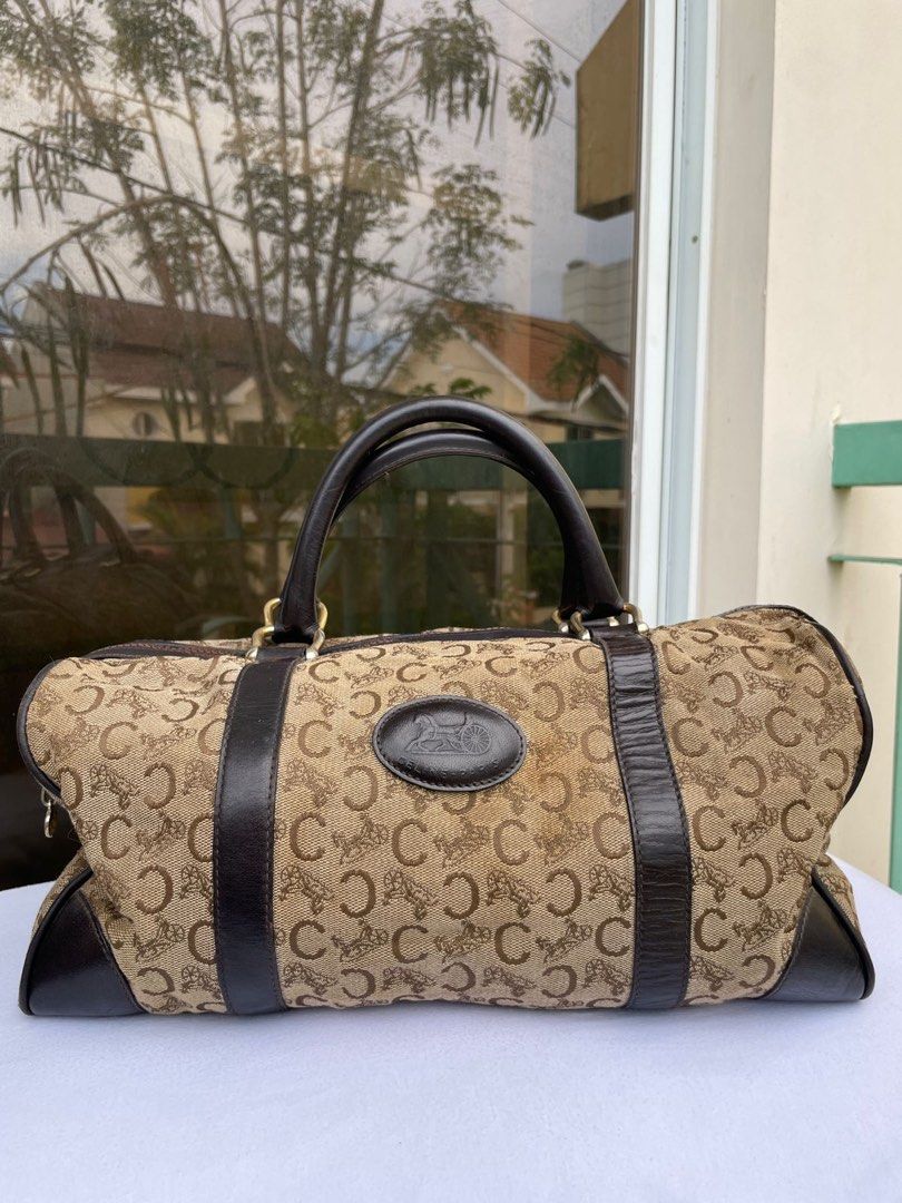 Celine Vintage Boston Bag 💯 AUTHENTIC (Category: Luxury Bags & Wallets) located in Muntinlupa City. Submitted by vintageboxfinds (Listing ID 1392047329, Image 1). Description: There are noticeable signs of wear, such as scratches, scuffs, or discoloration, especially on the corners or hardware. Despite cosmetic flaws, the item is still functional and stylish, priced accordingly to reflect its condition. + SF (NO RETURN NO EXHANGE) .