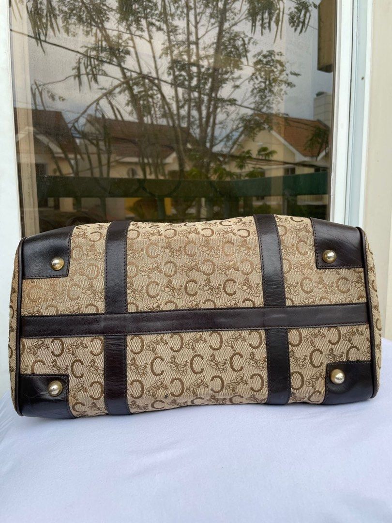 Celine Vintage Boston Bag 💯 AUTHENTIC (Category: Luxury Bags & Wallets) located in Muntinlupa City. Submitted by vintageboxfinds (Listing ID 1392047329, Image 3). Description: There are noticeable signs of wear, such as scratches, scuffs, or discoloration, especially on the corners or hardware. Despite cosmetic flaws, the item is still functional and stylish, priced accordingly to reflect its condition. + SF (NO RETURN NO EXHANGE) .