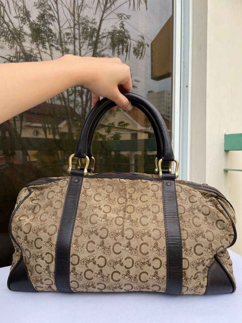 Celine Vintage Boston Bag 💯 AUTHENTIC (Category: Luxury Bags & Wallets) located in Muntinlupa City. Submitted by vintageboxfinds (Listing ID 1392047329, Image 2). Description: There are noticeable signs of wear, such as scratches, scuffs, or discoloration, especially on the corners or hardware. Despite cosmetic flaws, the item is still functional and stylish, priced accordingly to reflect its condition. + SF (NO RETURN NO EXHANGE) .