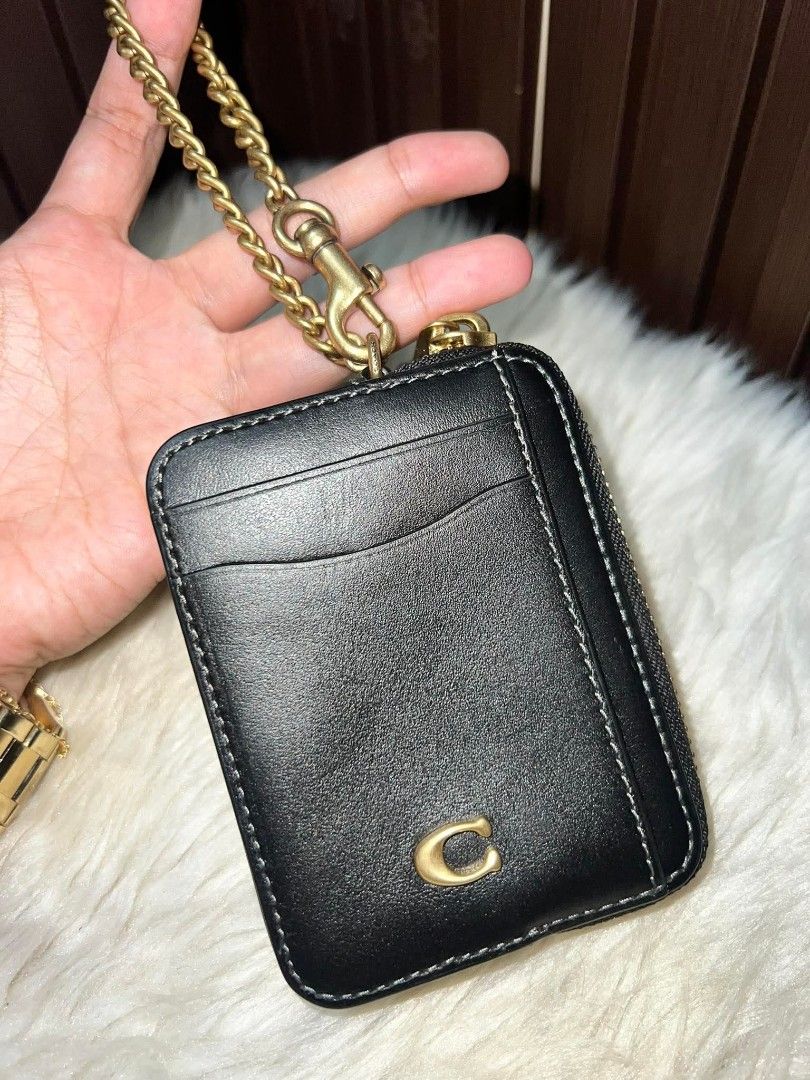 Coach Cardcase on chain wallet (Category: Luxury Bags & Wallets) located in Caloocan City. Submitted by ericavi_g (Listing ID 1392042425, Image 1). Description: ‼️‼️Branew‼️‼️Selling low‼️‼️ Guaranteed Original Avail Color. Black and Mapple Good deal Super ganda nyan mga sis.