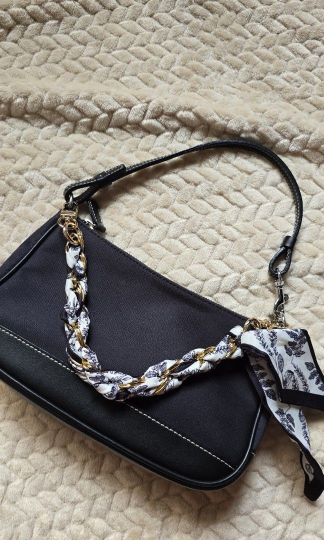 Coach Demi Pochette in Canvas (Category: Luxury Bags & Wallets) located in Taguig. Submitted by the.seekers.ph (Listing ID 1392114500, Image 2). Description: Overall Condition 9.8/10 Hardware 9.8/10 Still with tag from Japan.