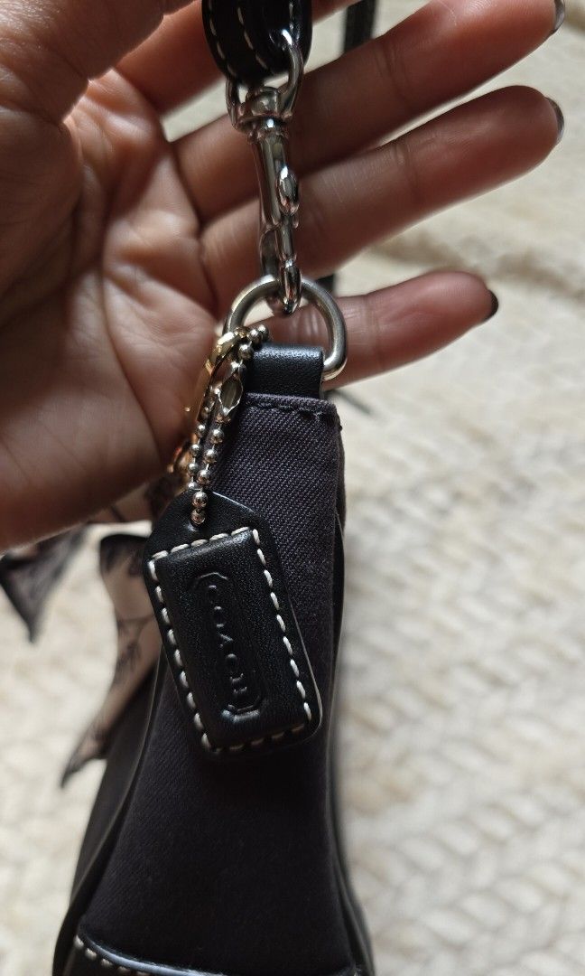 Coach Demi Pochette in Canvas (Category: Luxury Bags & Wallets) located in Taguig. Submitted by the.seekers.ph (Listing ID 1392114500, Image 3). Description: Overall Condition 9.8/10 Hardware 9.8/10 Still with tag from Japan.
