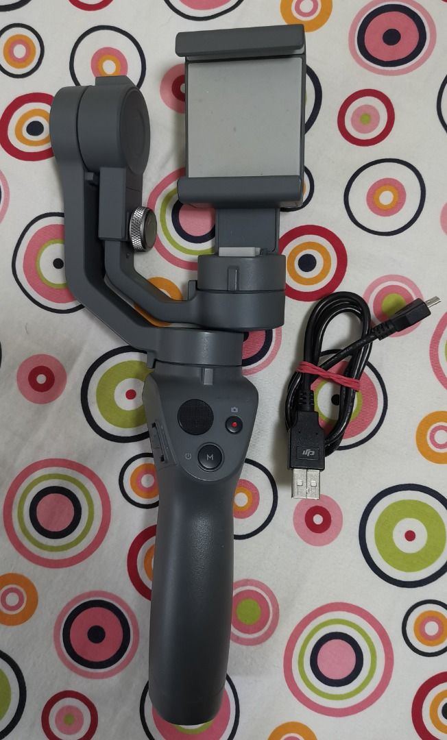 DJI Osmo Mobile 2 (Category: Gimbals & Stabilizers ) located in Quezon City. Submitted by deklattering (Listing ID 1391954317, Image 1). Description: medyo matagal ng hindi ginamit, nakastock lang price is still negotiable So please manage your expectations.