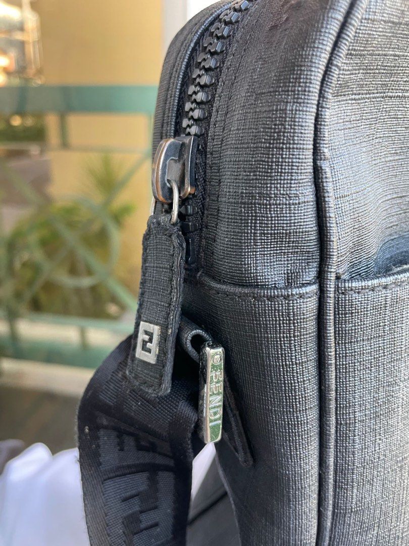 Fendi Messenger Bag Men 💯 AUTHENTIC (Category: Luxury Bags & Wallets) located in Muntinlupa City. Submitted by vintageboxfinds (Listing ID 1392047704, Image 2). Description: There are noticeable signs of wear, such as scratches, scuffs, or discoloration, especially on the corners or hardware. Despite cosmetic flaws, the item is still functional and stylish, priced accordingly to reflect its condition. + SF (NO RETURN NO EXHANGE) .
