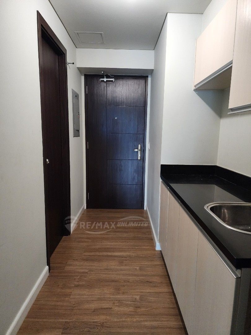 FOR SALE: Kroma Studio with Parking (Category: Apartments & Condos) located in Makati City. Submitted by metrodwellings (Listing ID 1392023978, Image 2). Description: For Sale: ** For DIRECT BUYERS only** - Studio unit with Parking slot - 27 square meters - With aircon and refrigerator - Unit facing Ayala Ave - Above 20th floor - Ready for move-in Price: 9.3M For Direct Buyers only. For property showing appointment, please contact: MARA LAZAGA DI