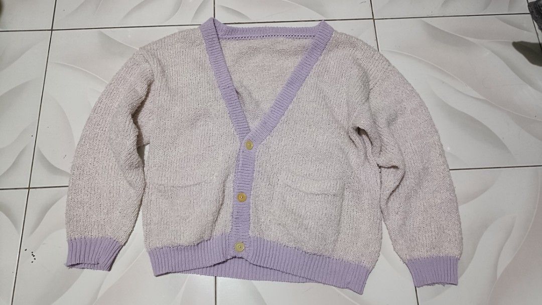 Knit Cardigan (Category: Coats, Jackets and Outerwear) located in Taguig. Submitted by schdxt (Listing ID 1392042267, Image 1). Description: Knit sweater. Heavily used and lightly discolored, no other flaws. No tags, possible free size, but approximately size L-XL in adults..