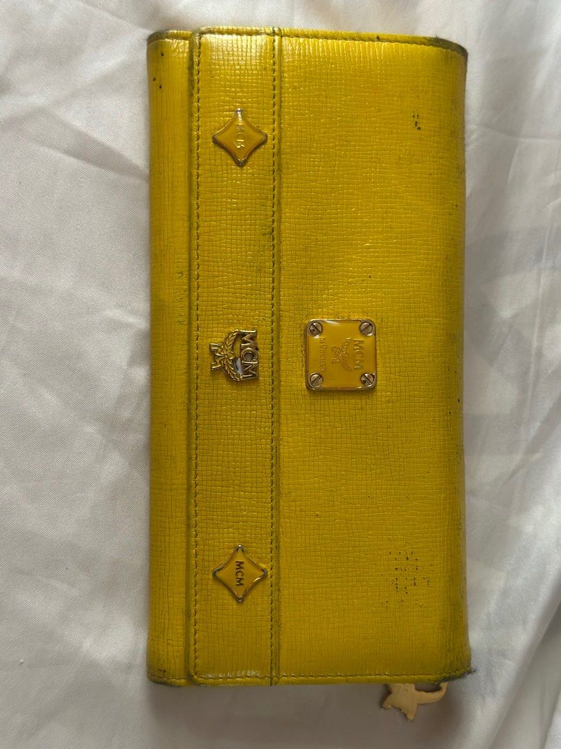 MCM Long wallet (Category: Luxury Bags & Wallets) located in Quezon City. Submitted by donaya_luxe (Listing ID 1392008432, Image 1). Description: Original Rubs and discoloration hence the price You can recolor and it will pass to brand new condition as this has no defects.
