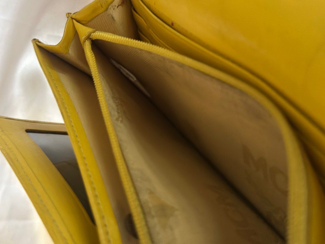 MCM Long wallet (Category: Luxury Bags & Wallets) located in Quezon City. Submitted by donaya_luxe (Listing ID 1392008432, Image 3). Description: Original Rubs and discoloration hence the price You can recolor and it will pass to brand new condition as this has no defects.