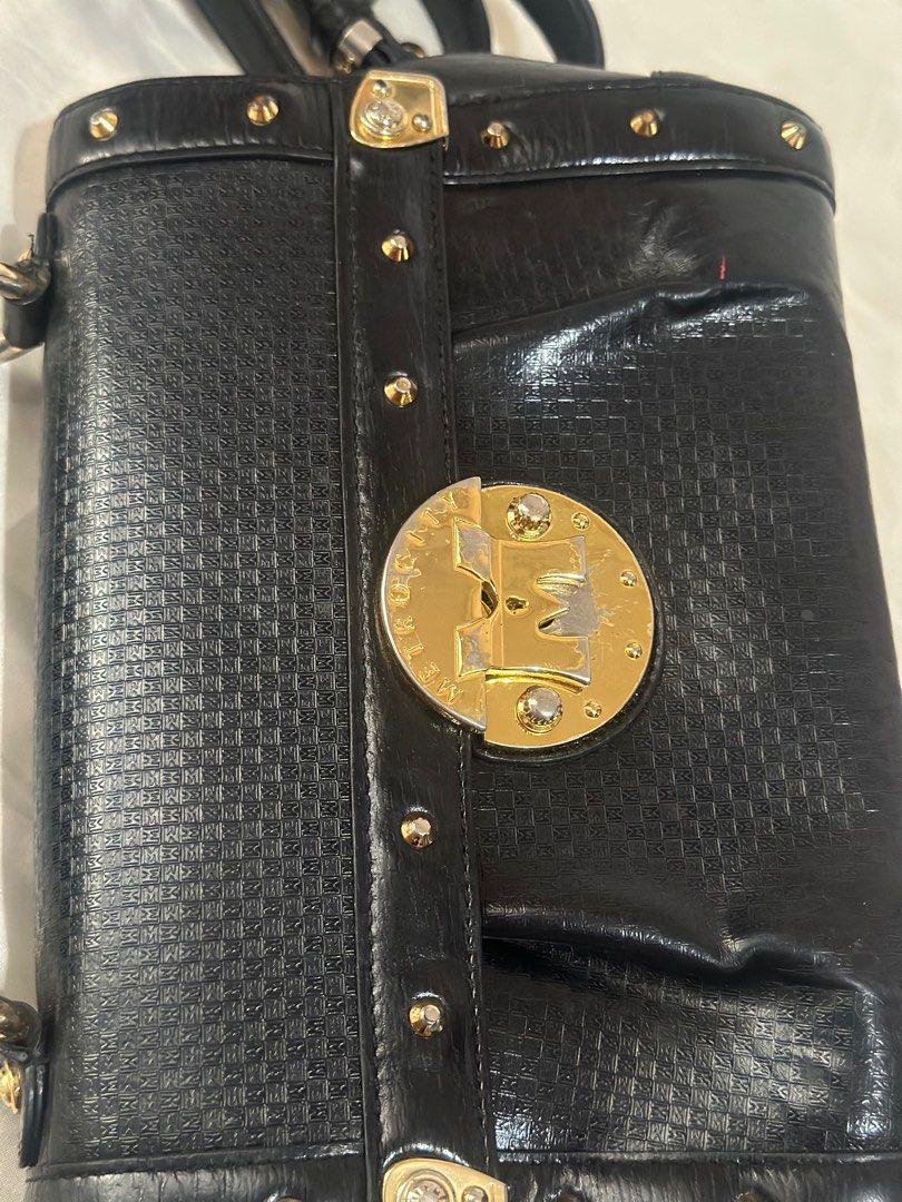 Metrocity Sling Bag (Category: Luxury Bags & Wallets) located in Quezon City. Submitted by donaya_luxe (Listing ID 1392005470, Image 3). Description: Very good condition Rubs and tarnishing of the hardware is in the pics Dimension approx 8.'5 x 6' x 3'.