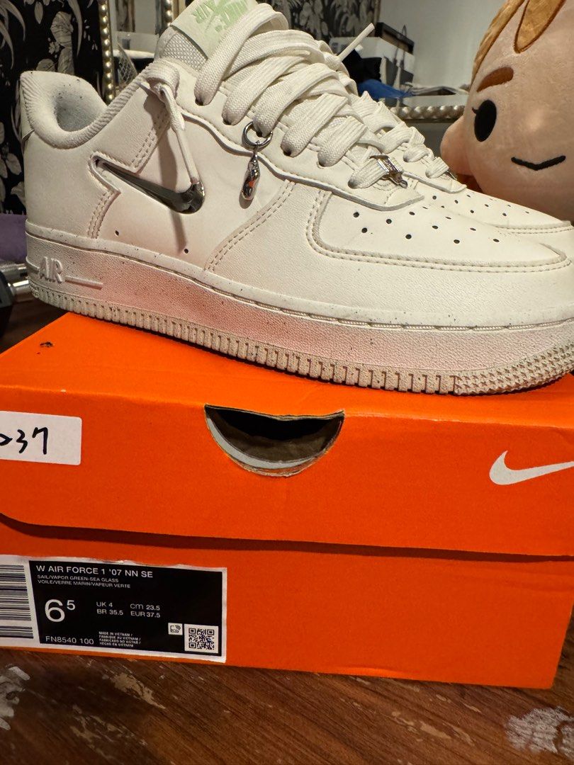 Nike air force silver charm (Category: Sneakers) located in Pasig City. Submitted by helpmedispose (Listing ID 1392060178, Image 1). Description: .